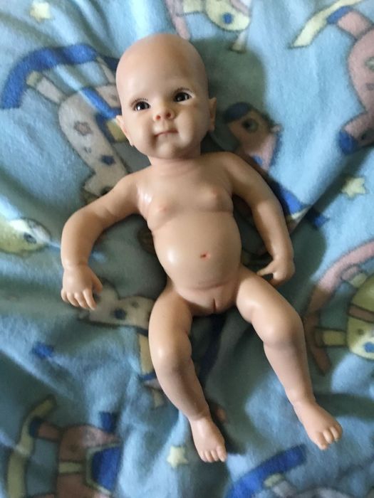 Boneca bebé reborn,verdadeiro silicone (artigos novos)