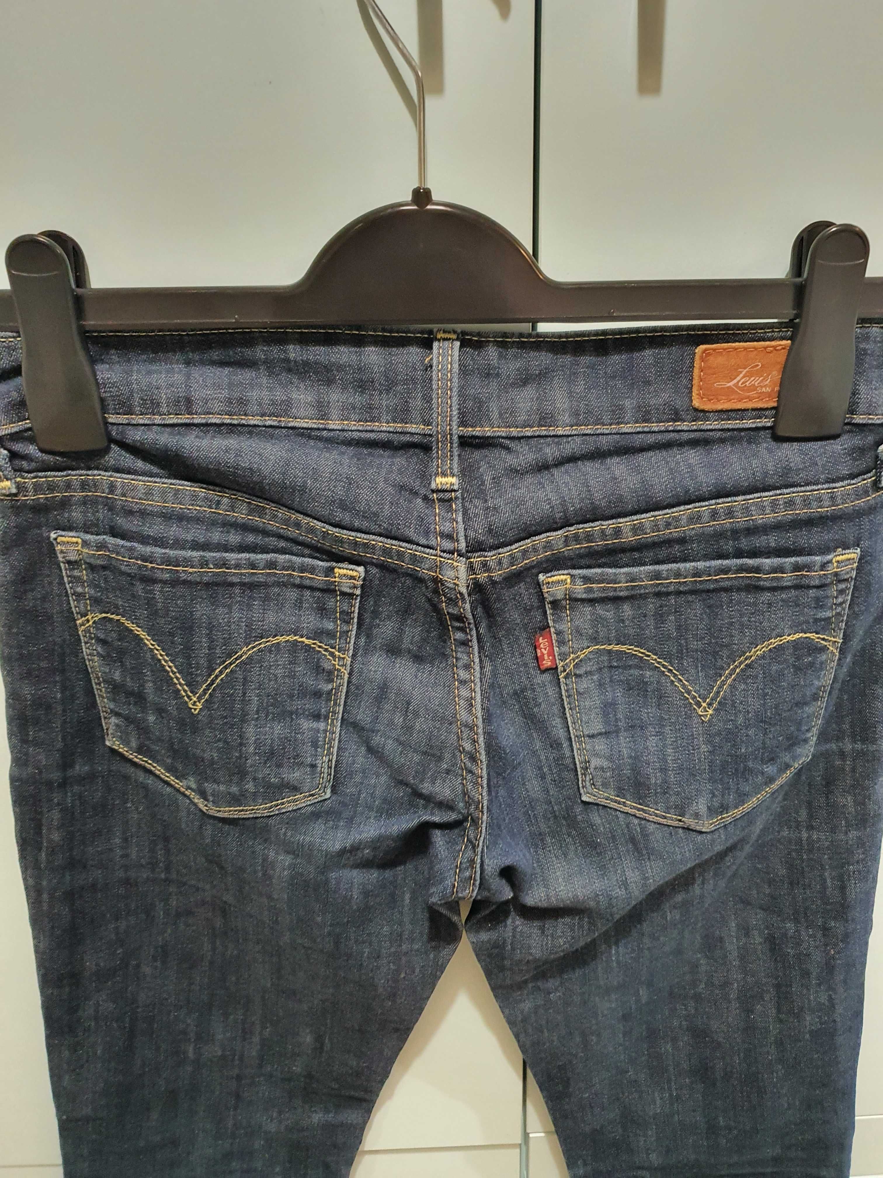 Spodnie Levi's damskie skinny jeansy rozmiar W25 L32 biodrówki