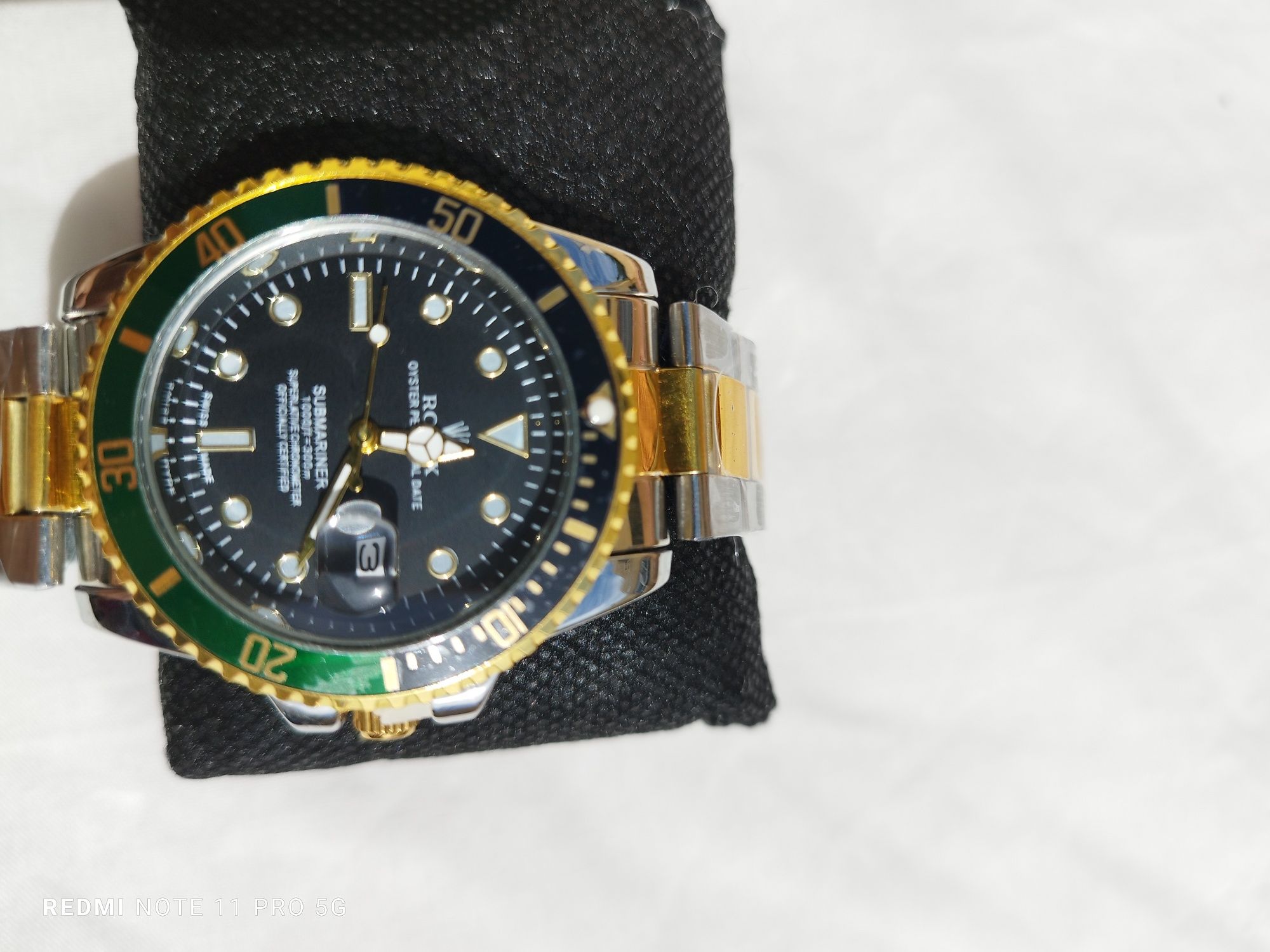 Relógio rolex dourado e verde