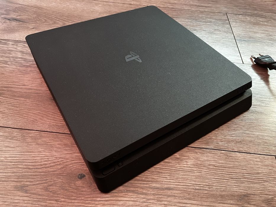 PlayStation 4 SLIM nowy dysk ssd/termopasta+ładowarka do padow i 4gry