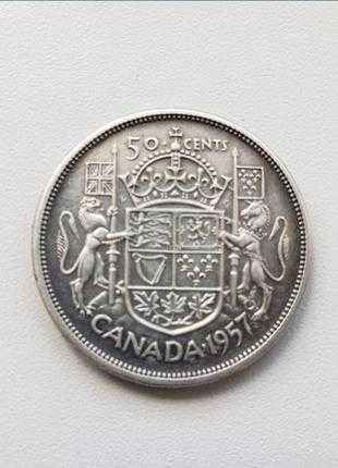 Серебряная монета 50 канадских центов 1957 года