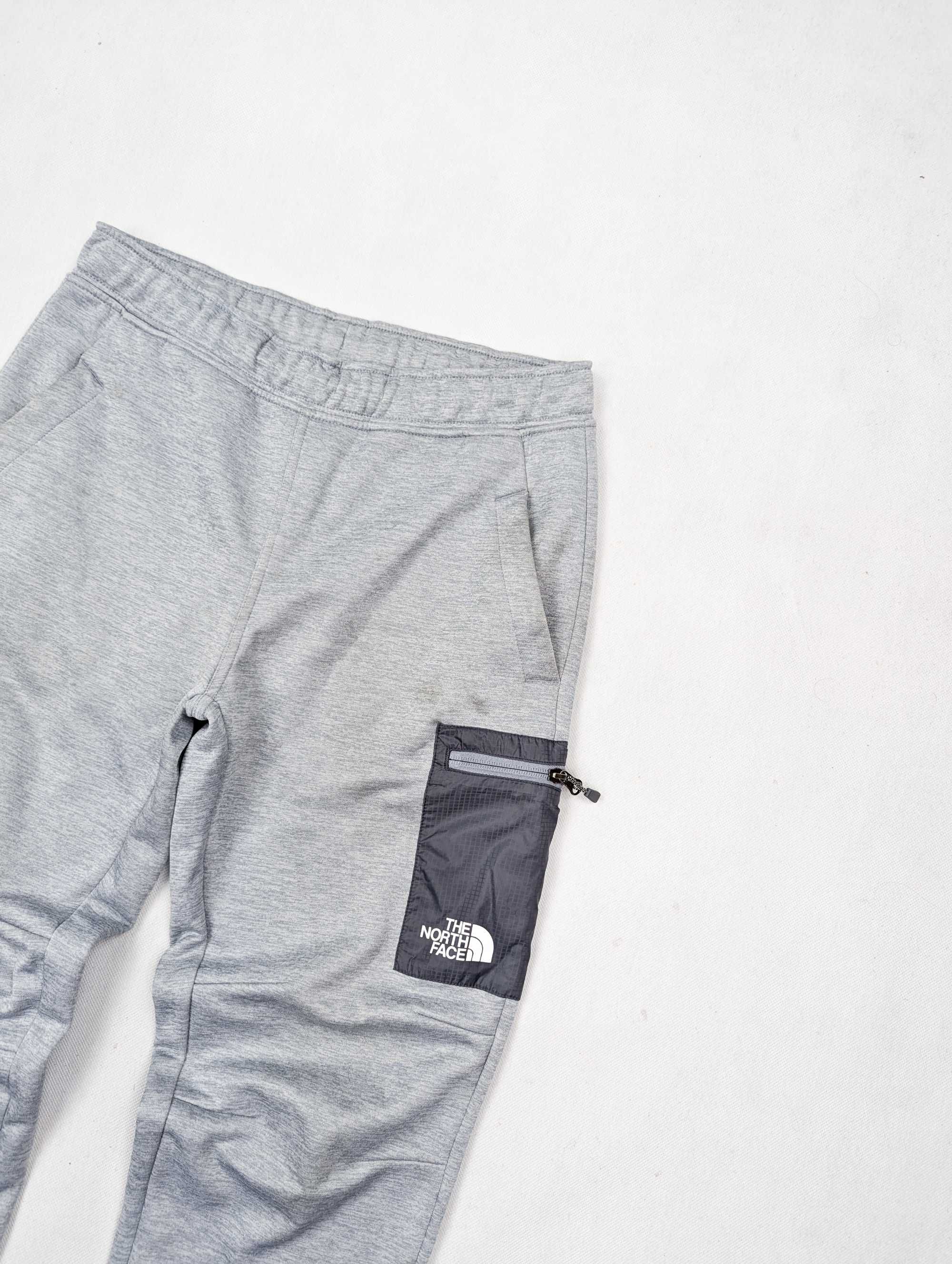The North Face szare spodnie dresowe dresy S logo