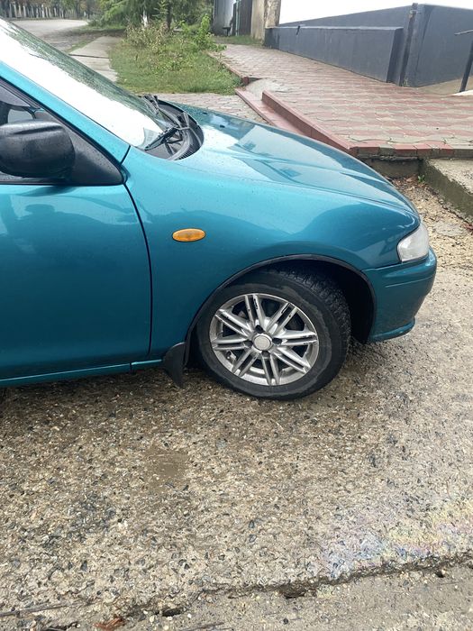 Мазда 323/ 1.5/акпп/1998