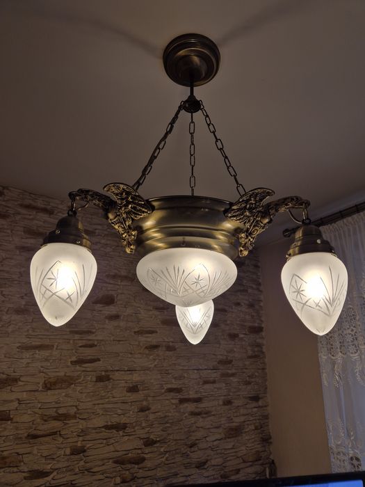 Żyrandol mosiężny z orłami