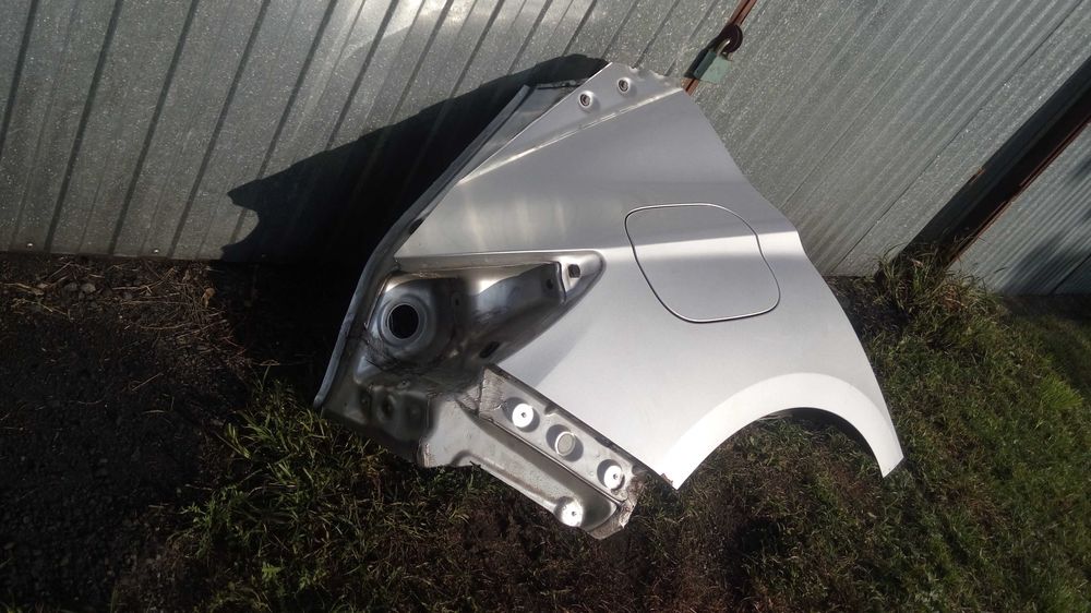 Opel Astra K V Błotnik tył tylny srebrny Z176 HB 5-drzwi