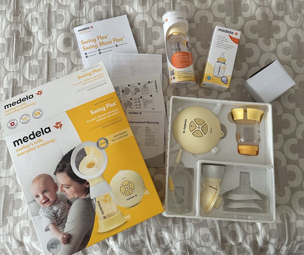 Молоковідсмоктувач Medela Swing Flex + пляшка Calma