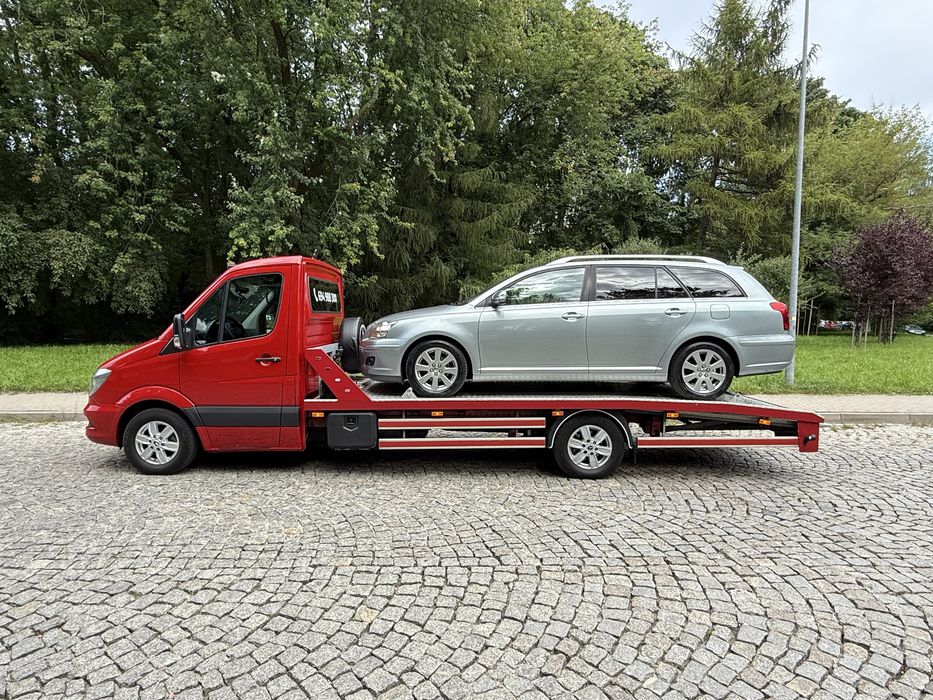 Usługi autolawetą, holowanie, transport, pomoc drogowa