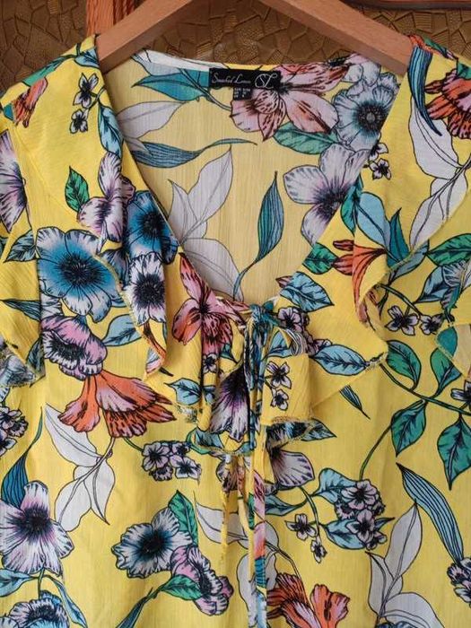 Żółta bluzka w kwiaty damska z falbanką