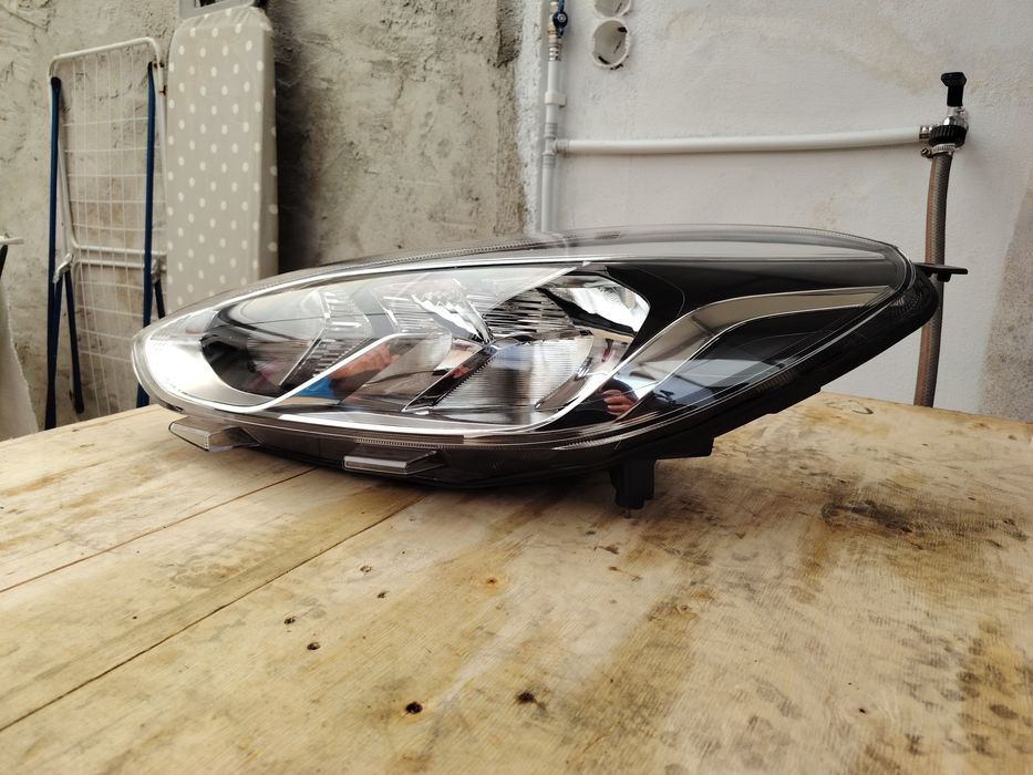 Farol esquerdo H1BB-13W030-AE
