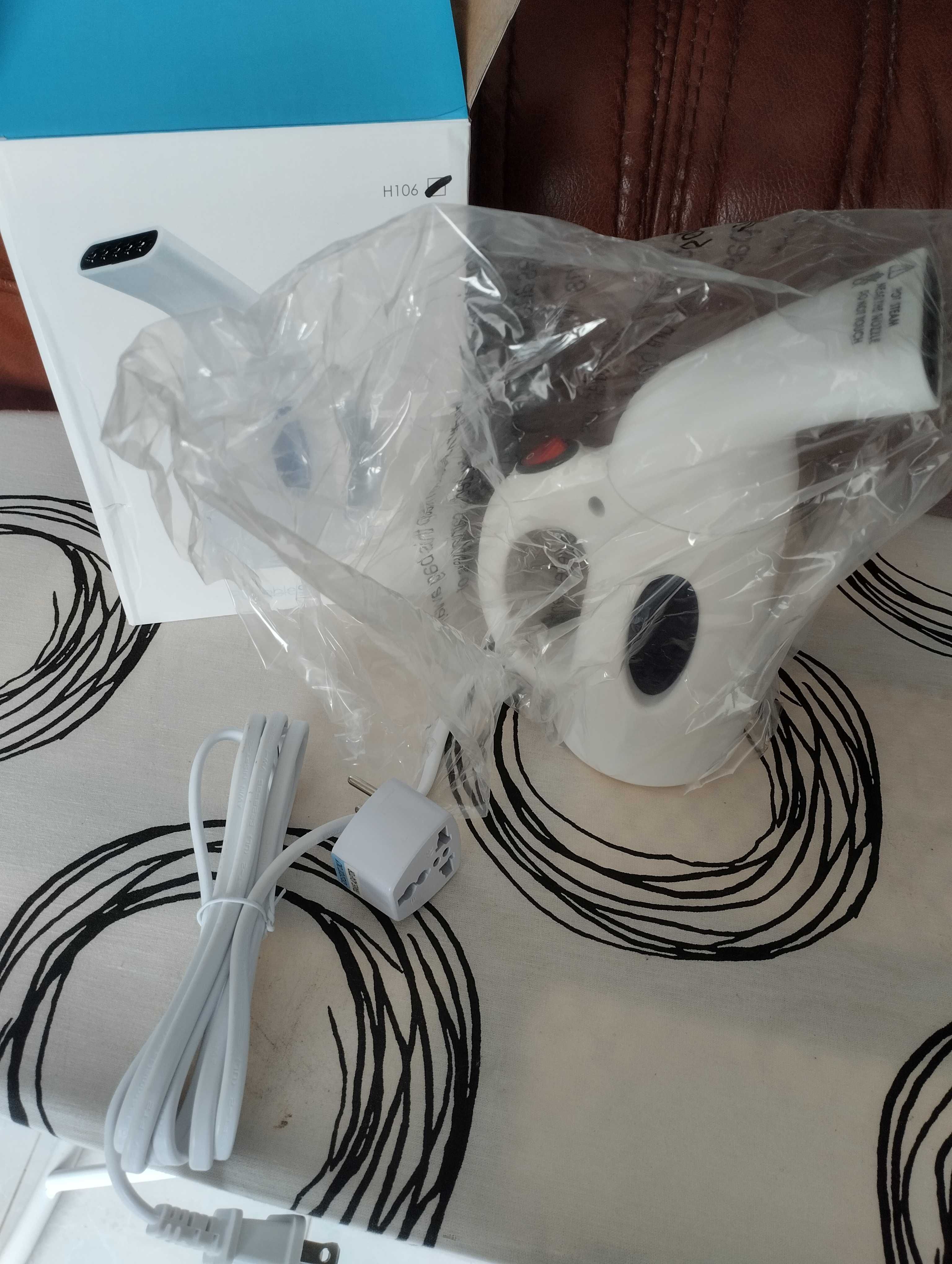 Ferro a vapor de roupas portátil