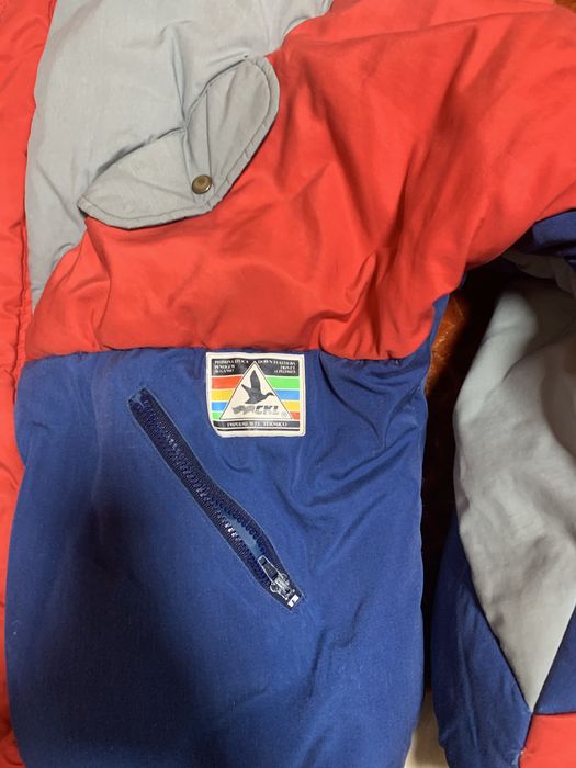 Kispo de penas de cor azul