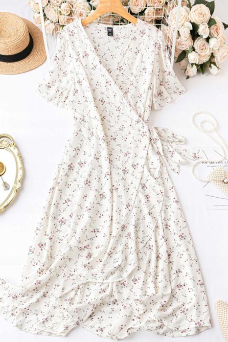 Kremowa kopertowa sukienka midi w kwiaty 44