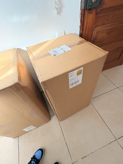 Mochilas da Glovo com capa de Chuva