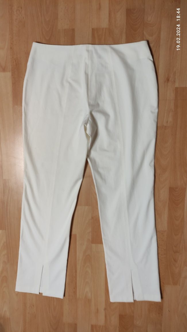 Bardzo eleganckie białe spodnie damskie Mergler 46