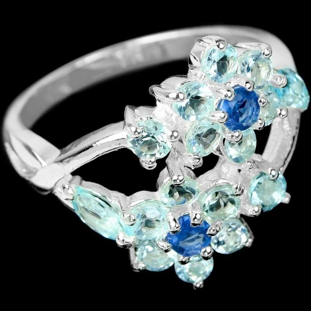 Серебряное кольцо с небесно -голубым топазом и сапфиром.Размер17.75