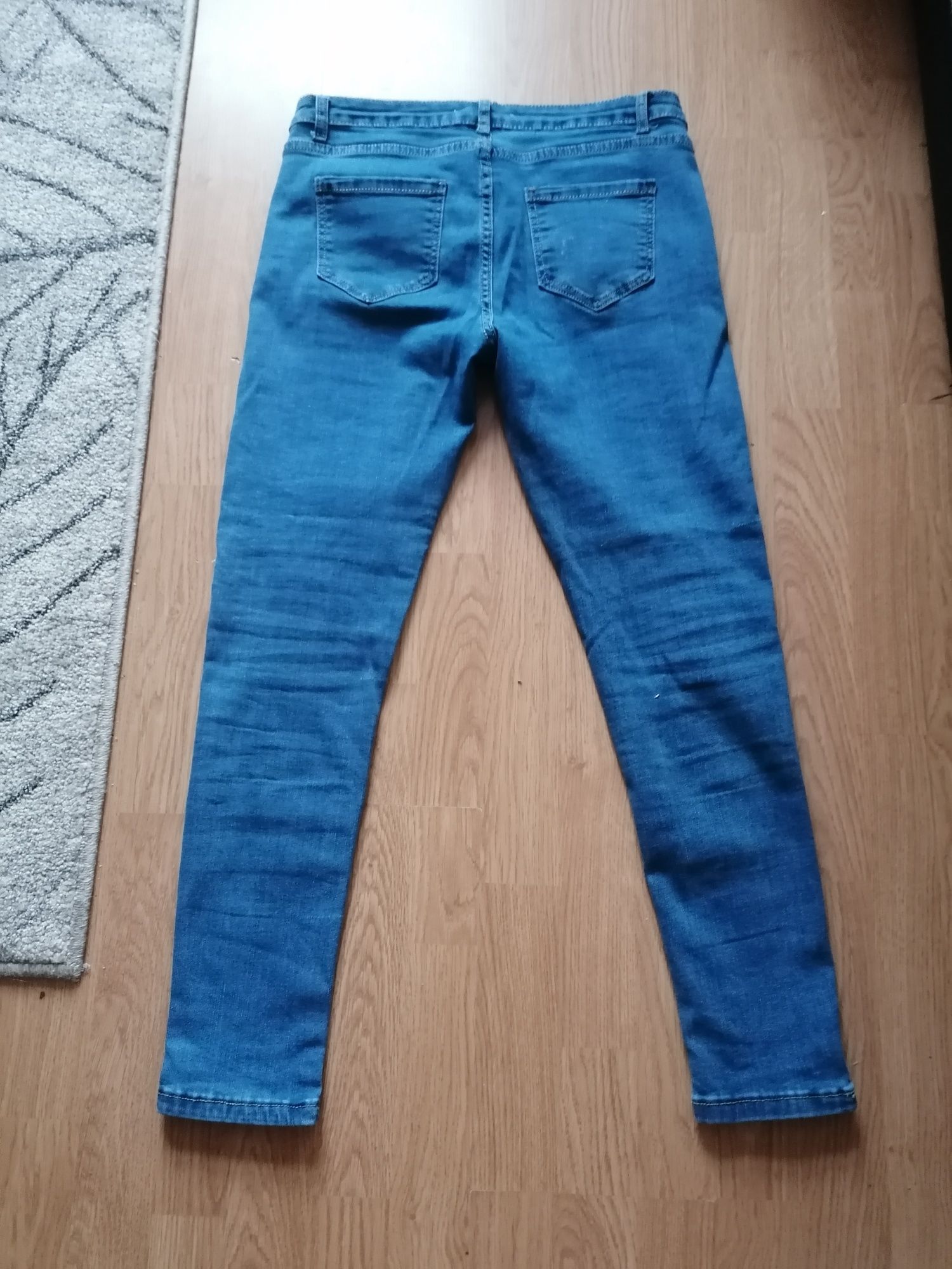 Spodnie jeans damskie jak nowe L