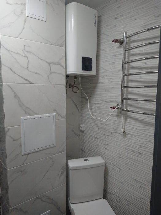 Сантехник Электрик Киев  ремонт установка бойлера Чистка .