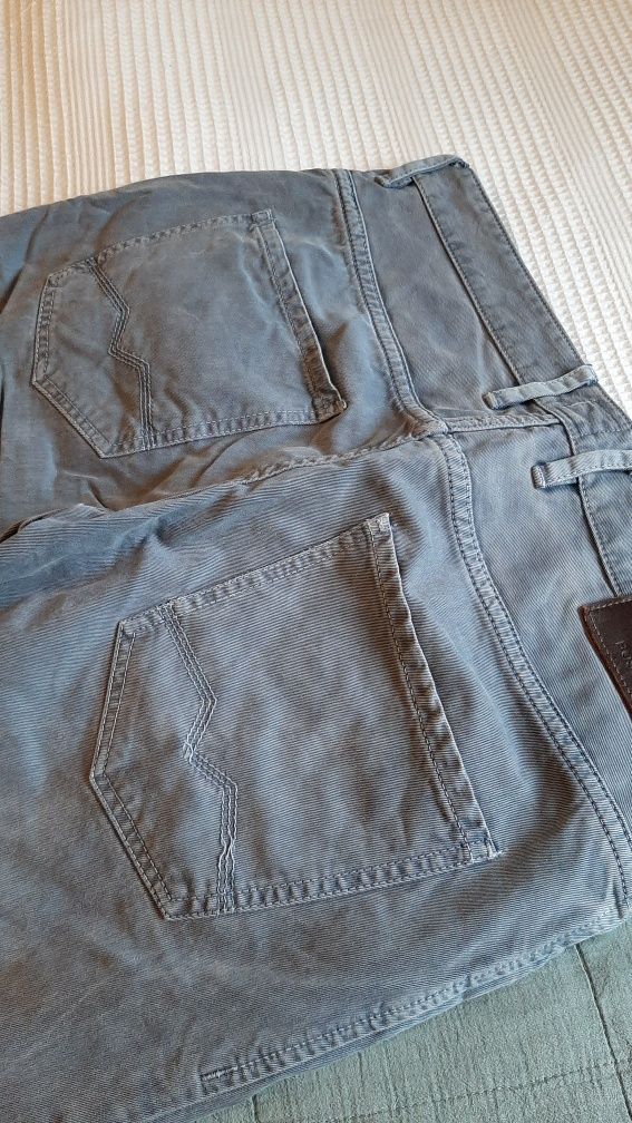 Spodnie , dżinsy firmy Hugo Boss, Orange 24 Barcelona. Szaro niebieski