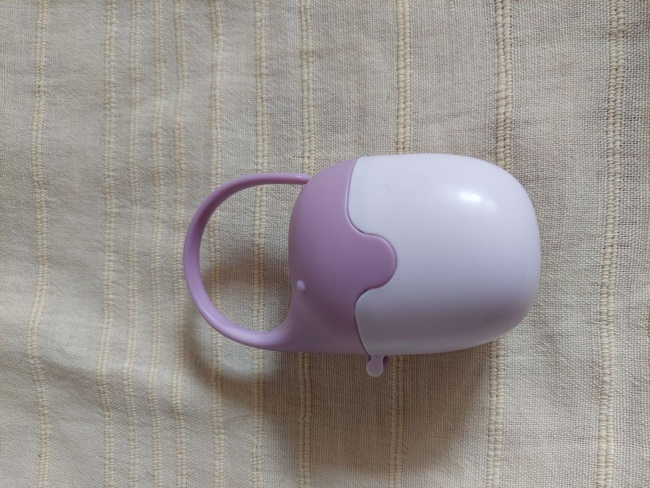 Nowy pojemnik na smoczek w kształcie slinika