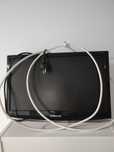 TV Samsung com suporte de parede