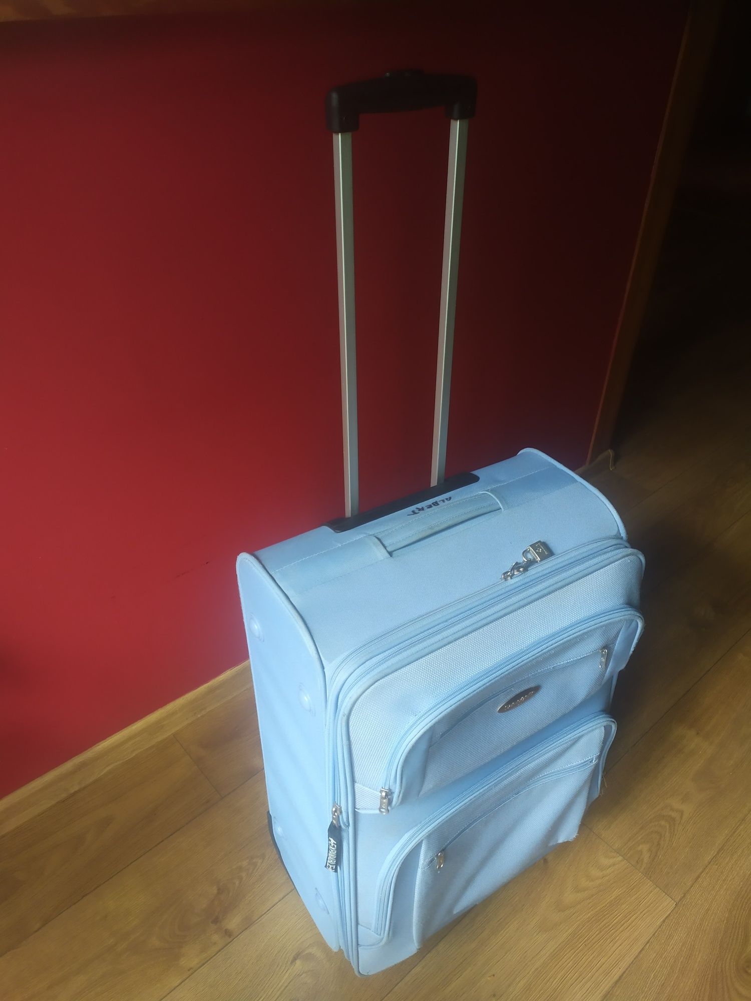 Duża walizka na 2 kółkach rozszerzana Samsonite błękitna 62x41x31cm