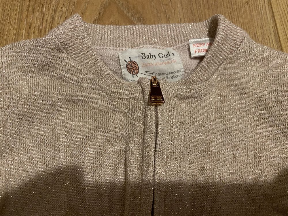 Śliczny brokatowy sweterek Zara