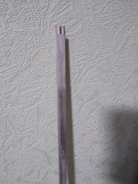 алюминиевая вставка между задними фанерами шкафа ГДР