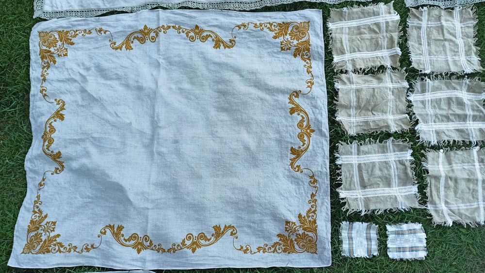Ozdobne lniane haftowane obrusy z serwetkami