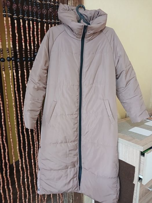 Пуховик новый,размер 46на 48 ,шикарный теплый,согреет в холодные зимни