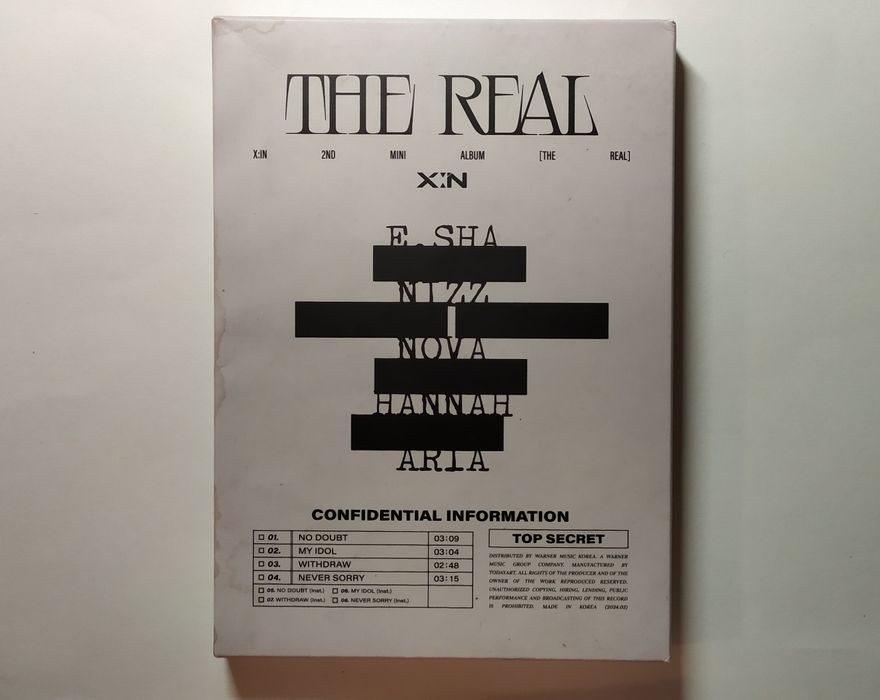 Альбом x:in - the real з карткою