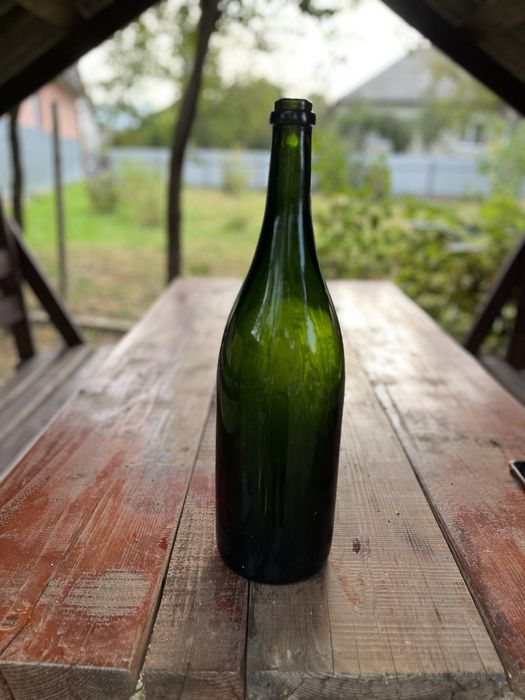 Продам велику скляну бутилку