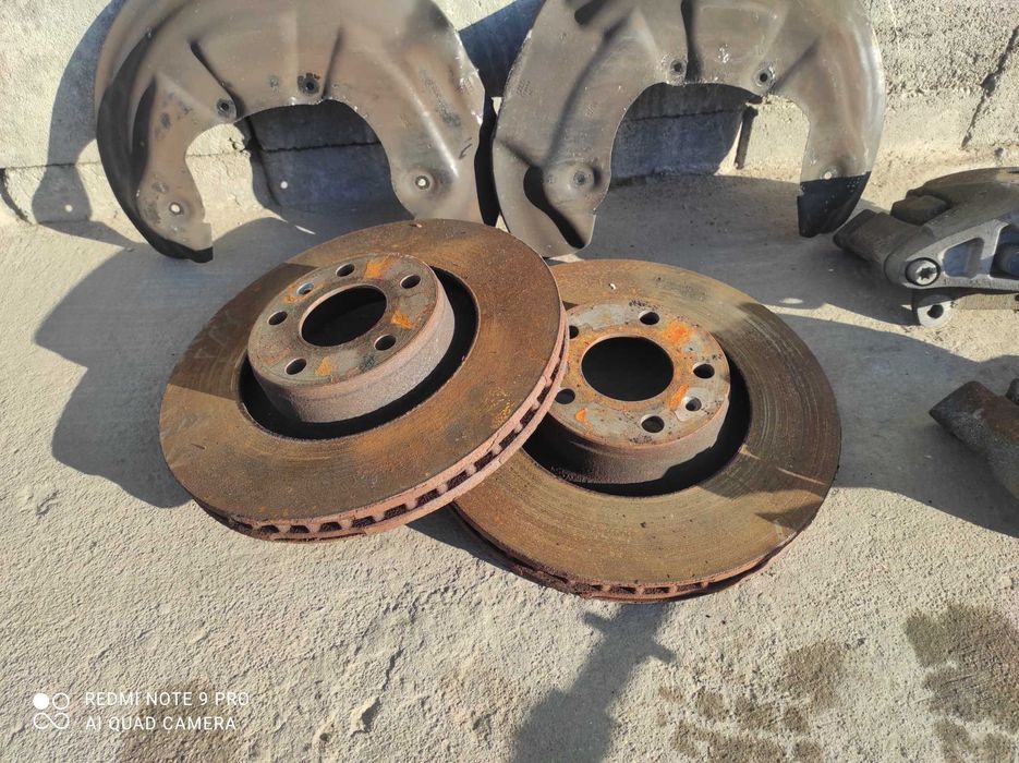 Audi A6 C6 a4 zaciski 974 973 jarzma 716 tarcze oryginał gwarancja 320