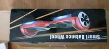 Hoverboard Smart Balance Wheel wraz z stelażem do jazdy na siedząco.