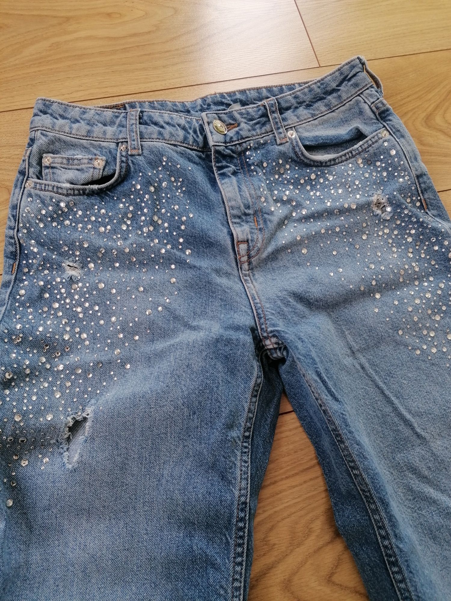 Spodnie damskie jeansowe z dziurami H&M rozmiar 38