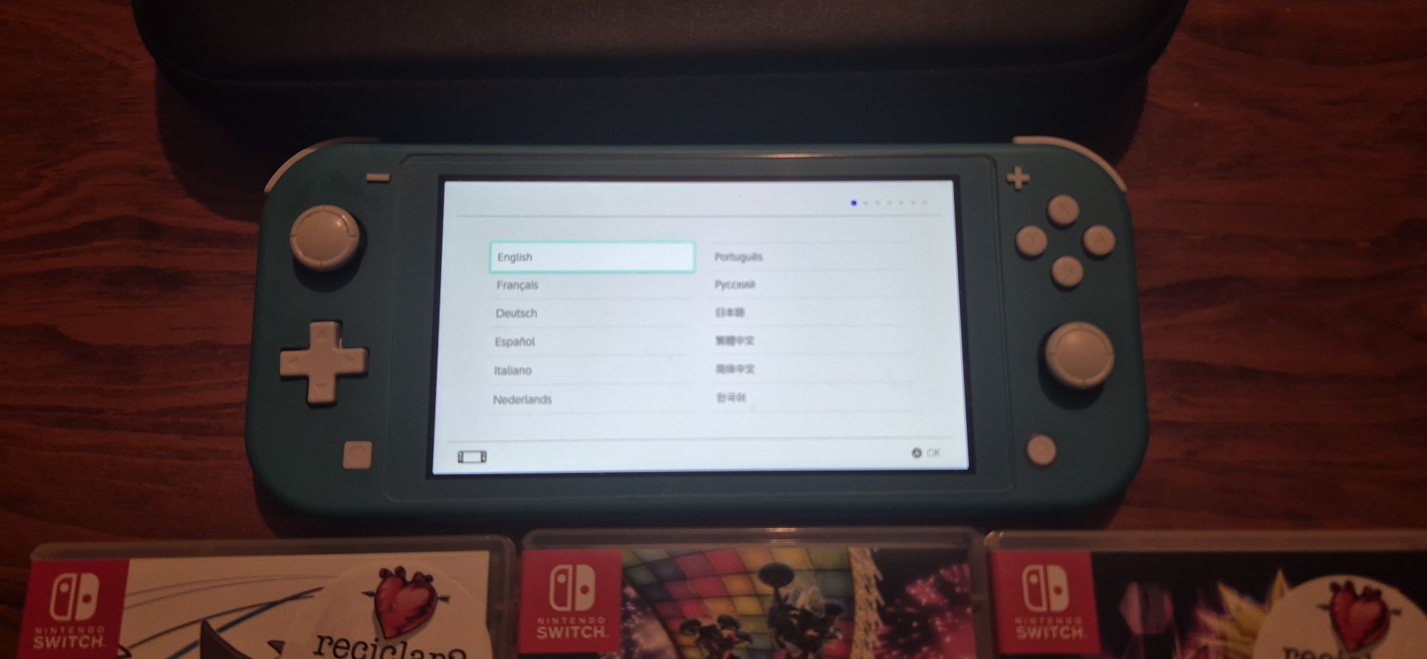 Nintendo switch lite + 3 Jogos