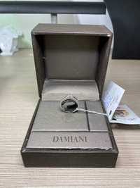 Золотое кольцо Damiani с бриллиантами.