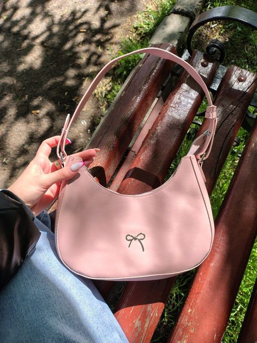 Жіноча рожева сумка з бантиком
