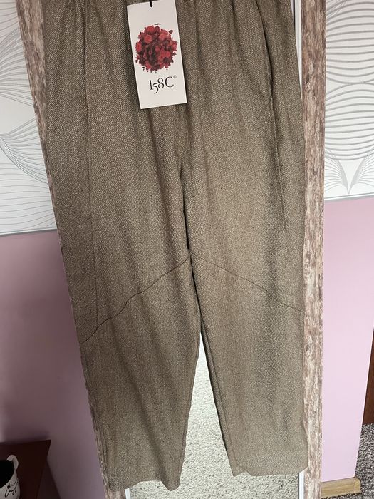 Spodnie bryczesy firmy 158c ciekawy materiał 42/44/46
