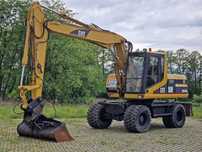 Caterpillar CAT M315 koparka kołowa  obrotowa Cat m 315 świeżo sprowadzona z Niemiec
