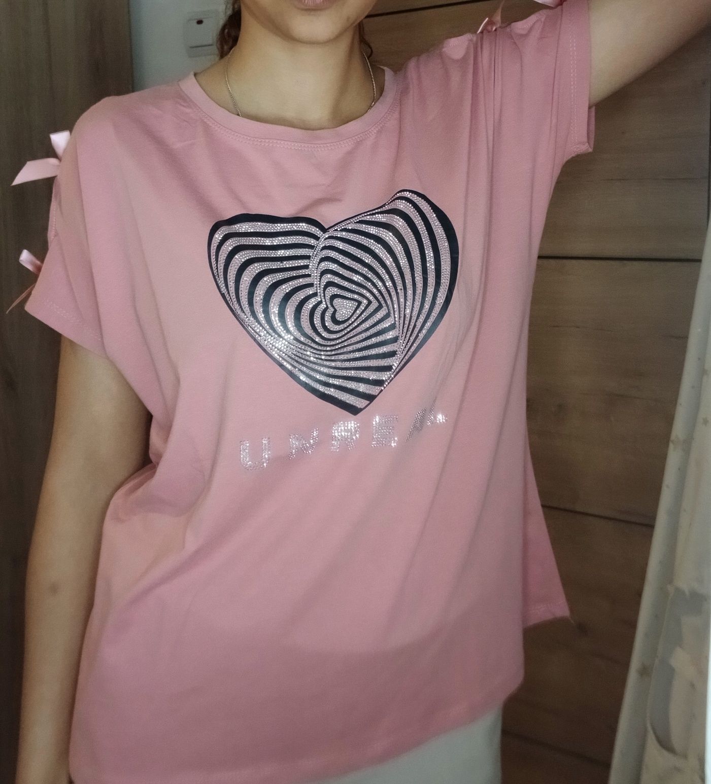 Blusa rosa com coração