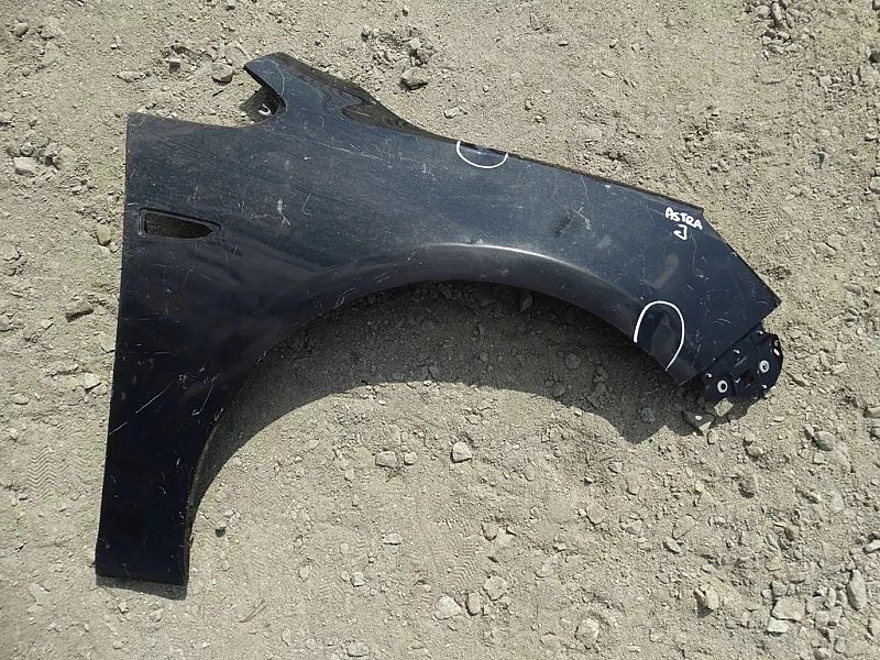 Błotnik prawy przedni Opel Astra J IV