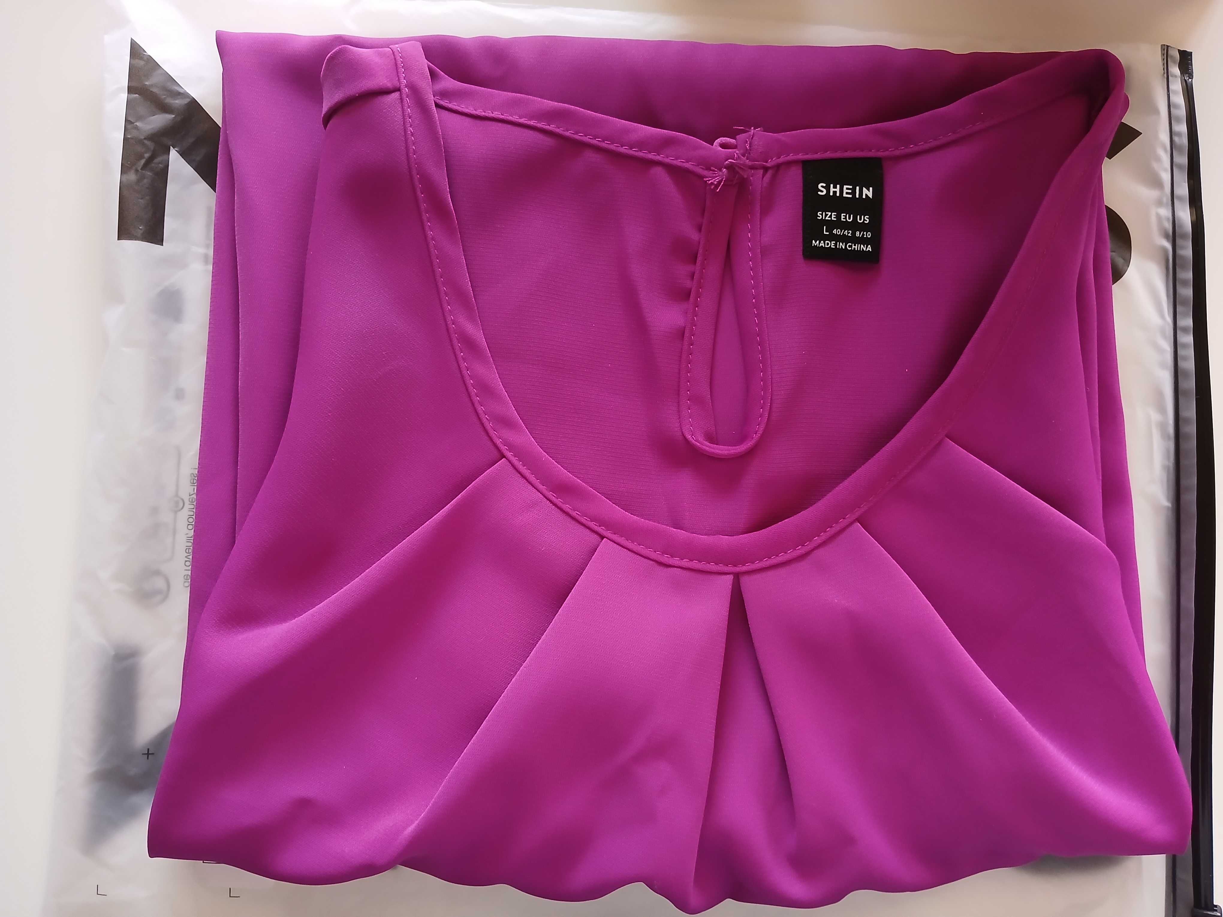 Blusa nova, Tam: L