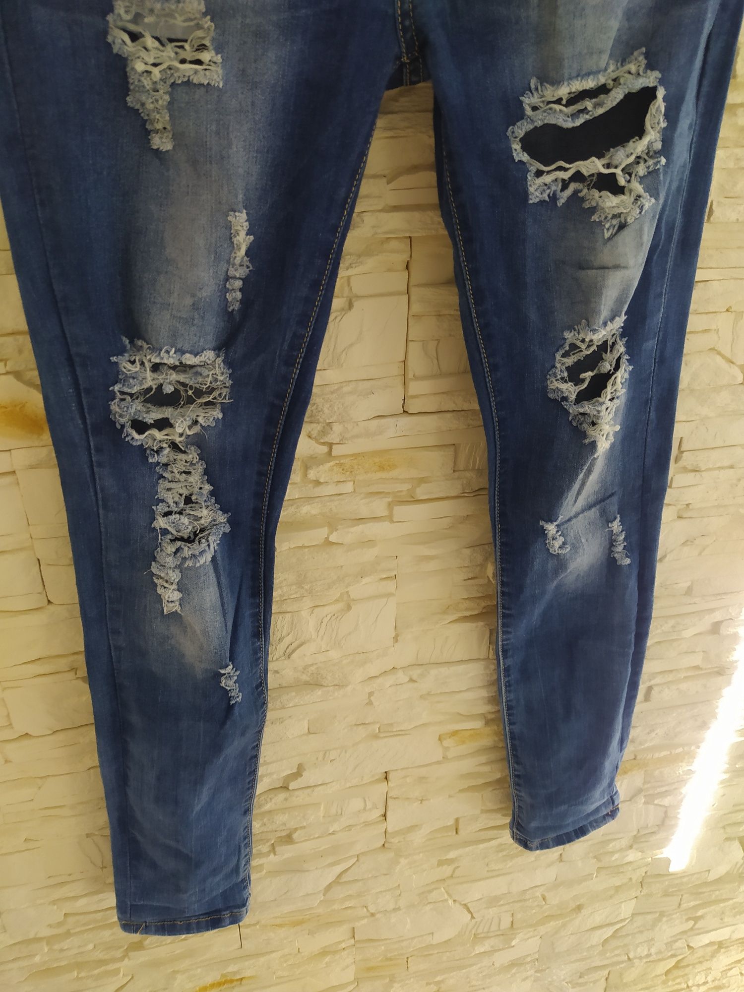 Spodnie jeans 38