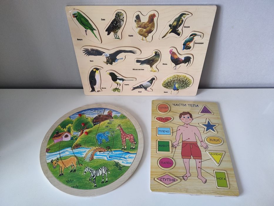 Дерев'яні іграшки пазли і вкладиші, вставки.