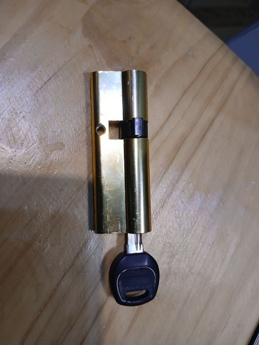 Wkładka do drzwi 35/60 mosiądz z jednym kluczykiem