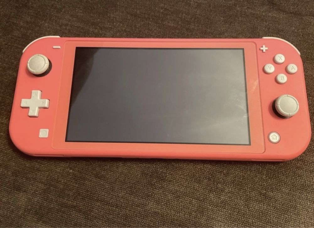 Nintendo Switch Lite Coral + Animal Crossing