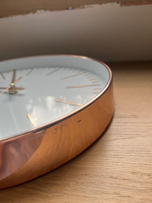 Zegar ścienny złoty miedź