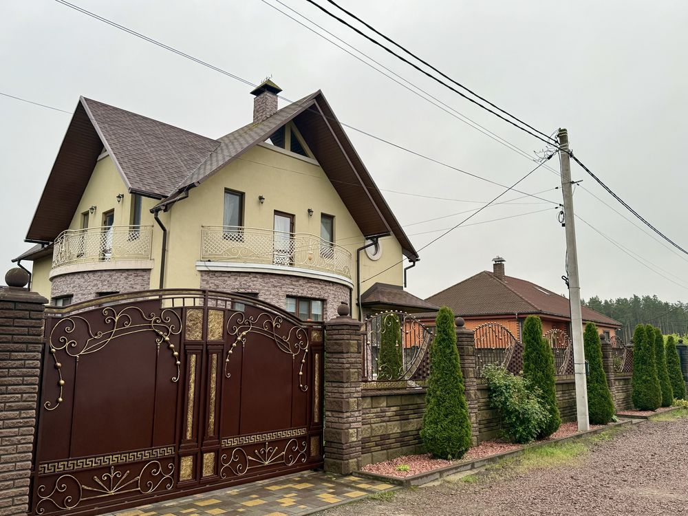 Сучасний  будинок.