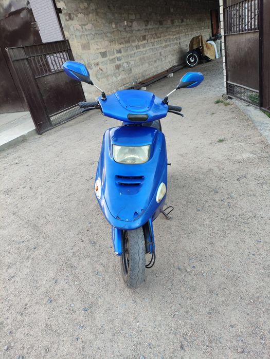 Продам скутер Rexon