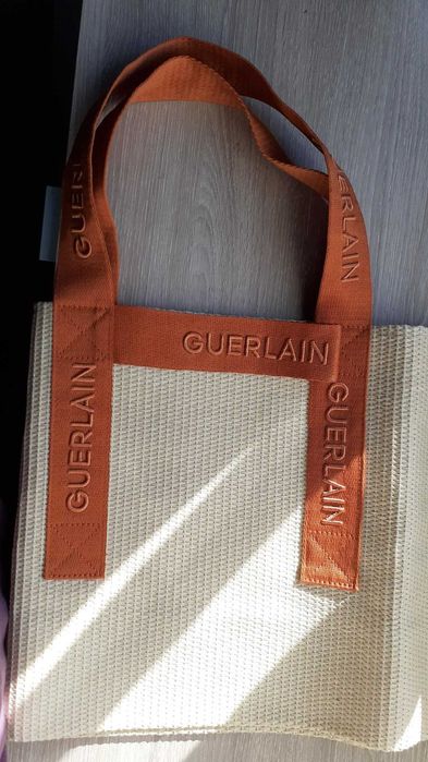 Saco beje Guerlain com pegas novo